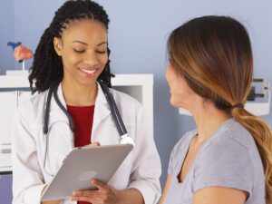 Image of a doctor talking to a patient