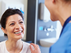 Image of a doctor with a smiling patient