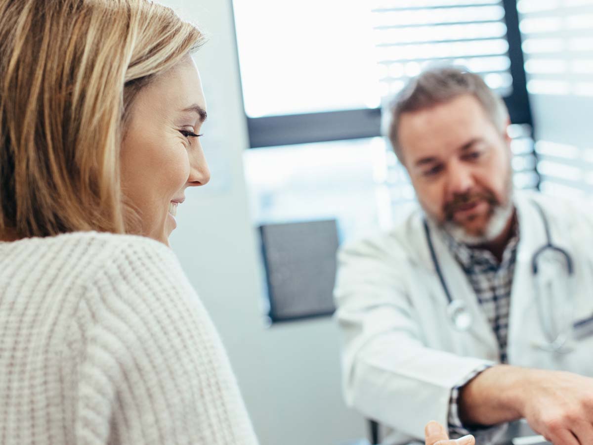 Doctor communicating and consulting with a patient