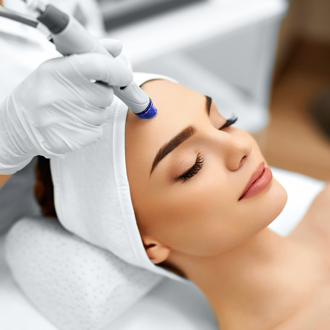 Woman getting a microdermabrasion treatment