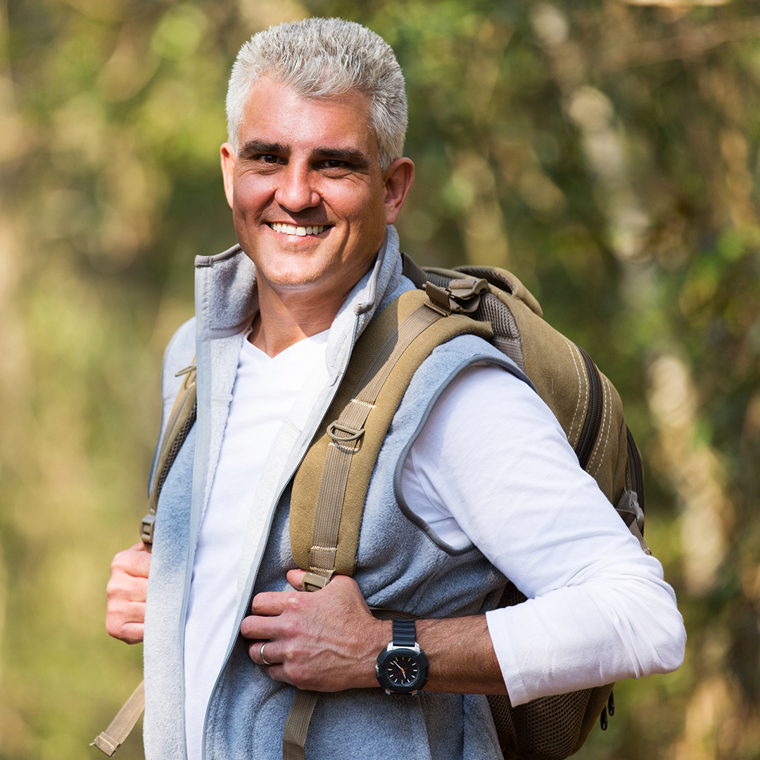 Happy man backpacking