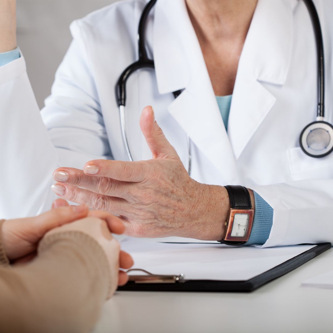 doctor talking to patient