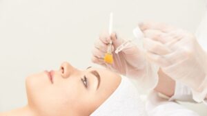 woman getting face peel