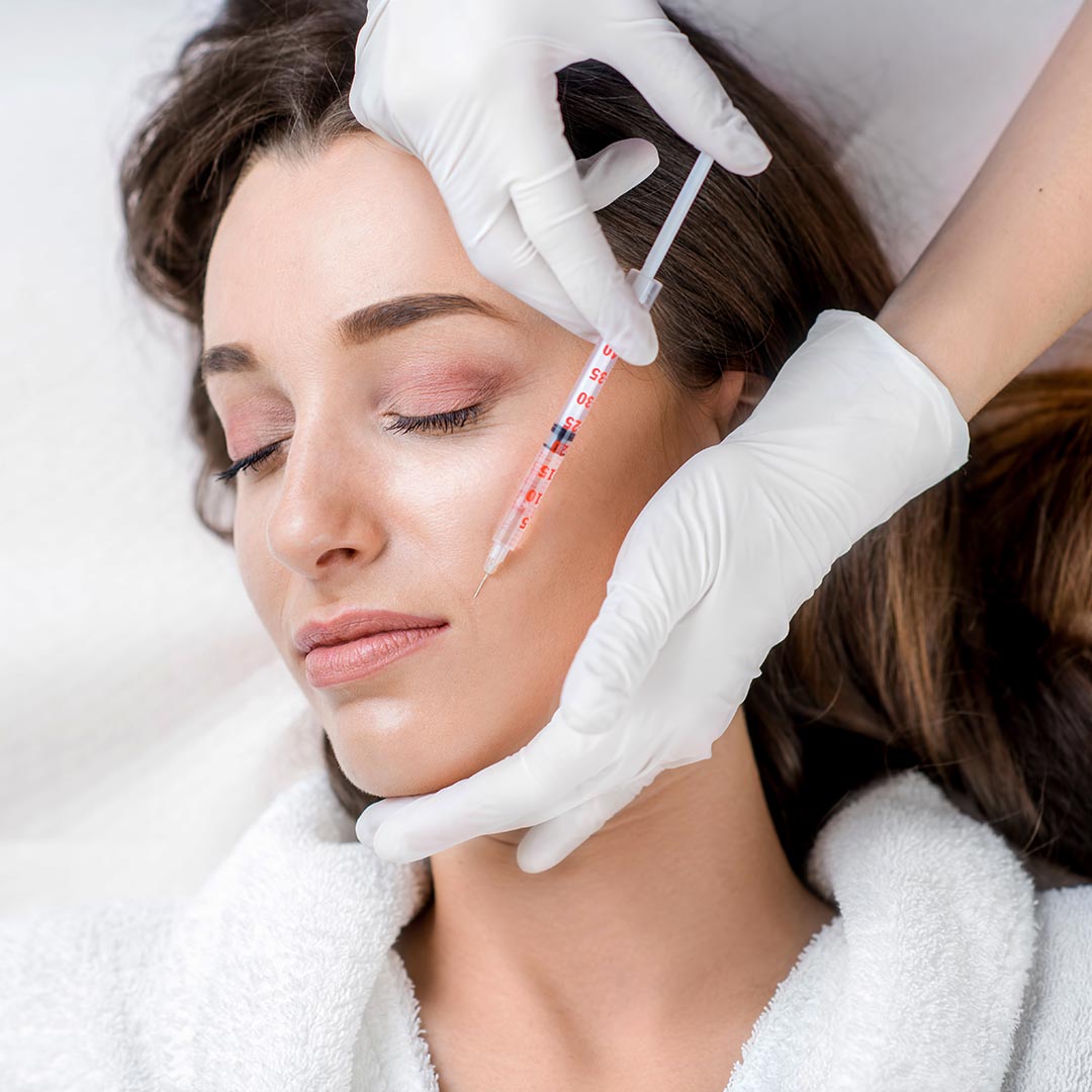 woman getting a filler injection