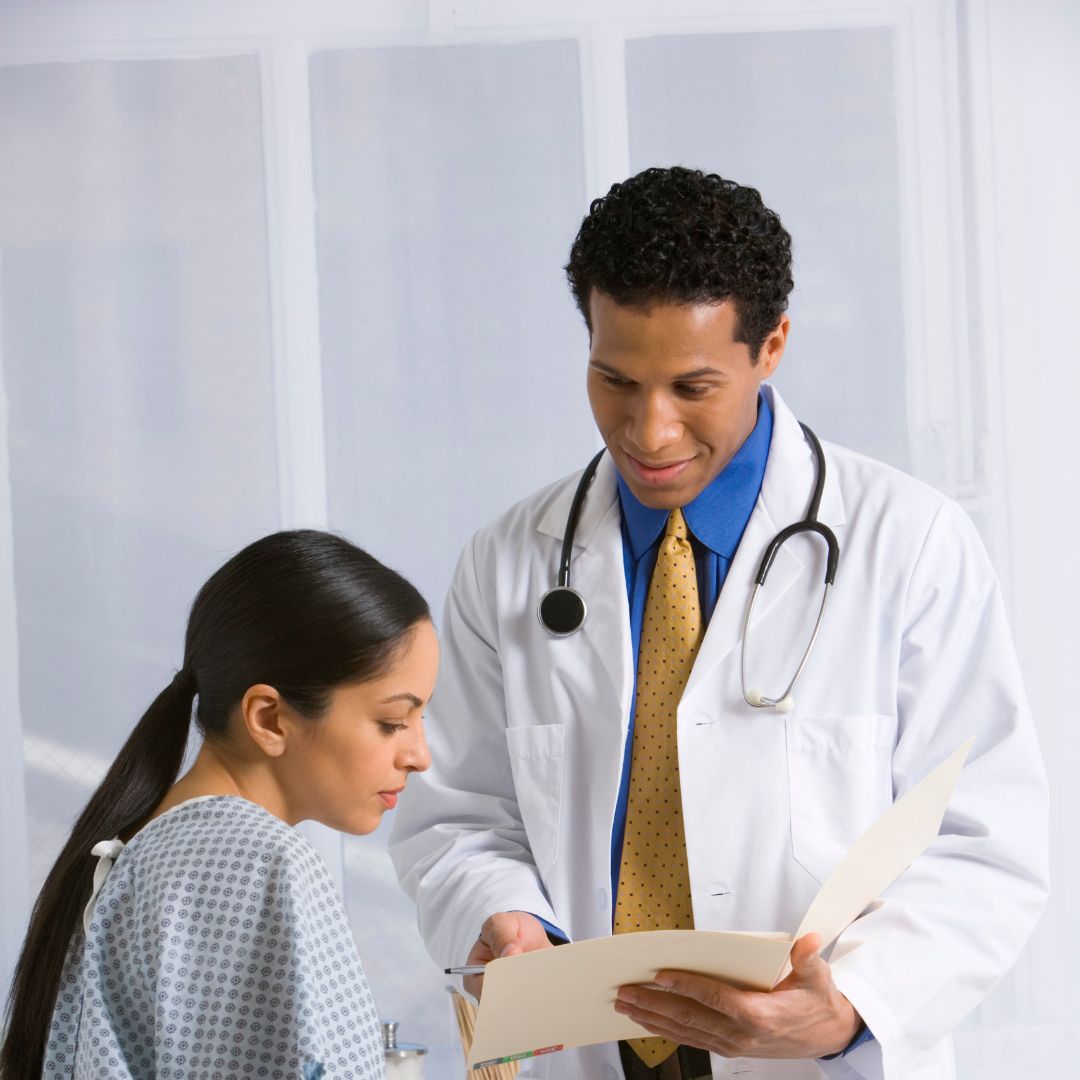 doctor talking with patient