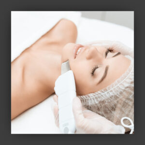 Woman receiving cosmetic facial treatment