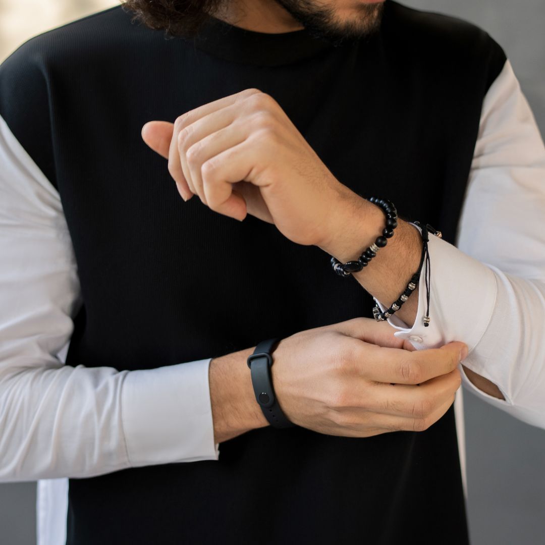 Man tying up his sleeve