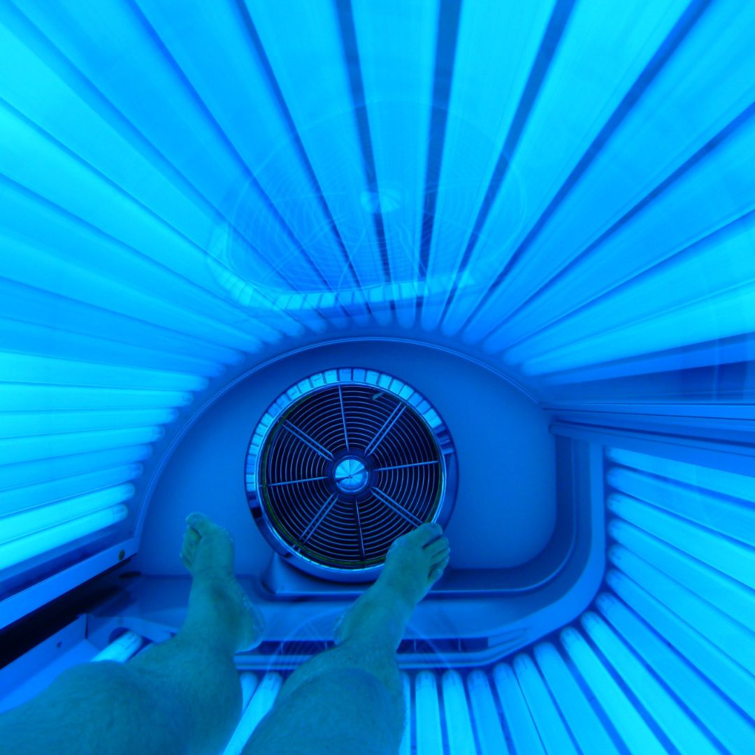Person inside a tanning bed