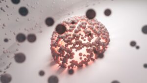 Microscopic 3D rendering of a spherical cell cluster, likely representing a tumor, surrounded by dark particles or cells.